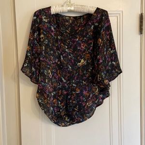 Size S blouse from Mendocino. Gently worn.